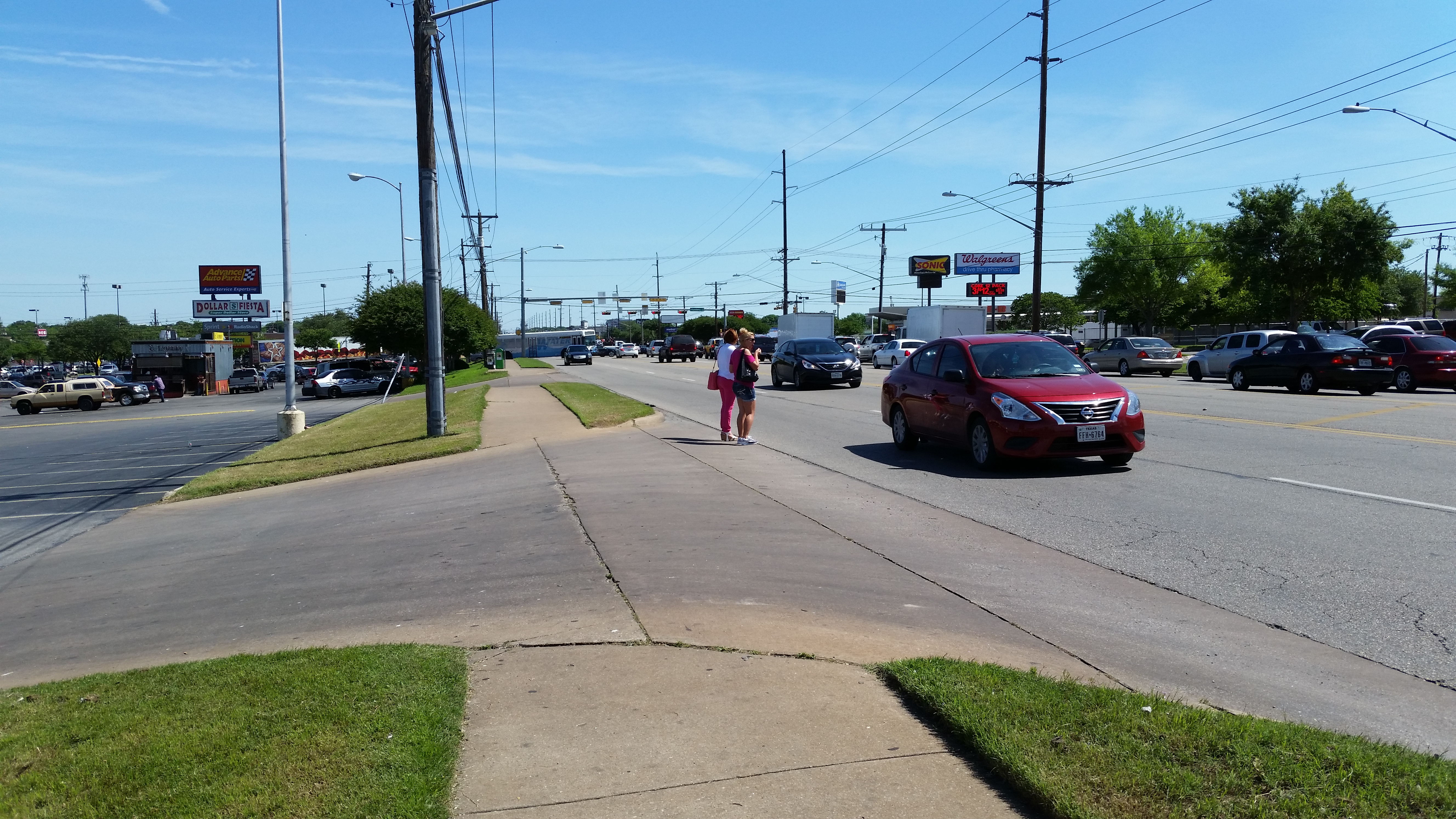 Ladies crossing N Lamar in the middle of the street